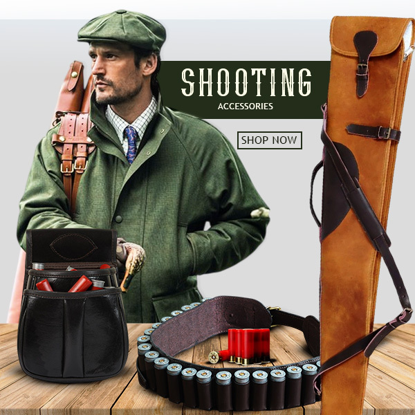 Man in green hunting jacket carrying a leather rifle case, surrounded by premium shooting accessories including a black leather ammo pouch, cartridge belt with shotgun shells, and tan leather gun slip.
