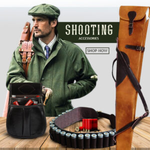Man in green hunting jacket carrying a leather rifle case, surrounded by premium shooting accessories including a black leather ammo pouch, cartridge belt with shotgun shells, and tan leather gun slip.